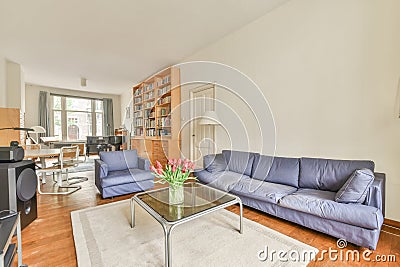 a living room with a couch and a coffee table Editorial Stock Photo