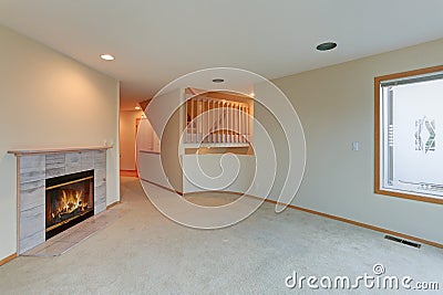 Living room features wood burning fireplace. Stock Photo