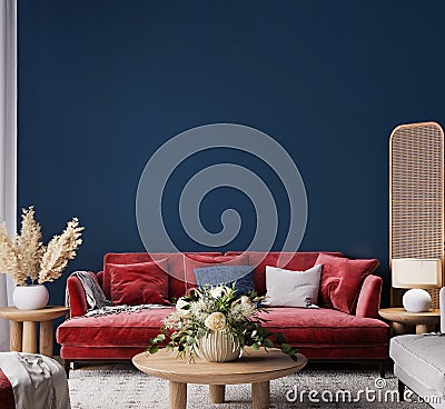 Living room interior mock-up with red sofa, wooden table and rattan home decoration in dark blue background Stock Photo