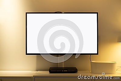 Living room led blank screen tv on concrete wall with wooden table and media player. Mockup blank screen TV for copy space Stock Photo