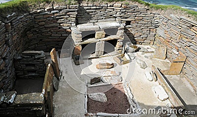 A Living Room in a Prehistoric village, Skara Brae, Bay of Skall. Orkney, Scotland UK Stock Photo