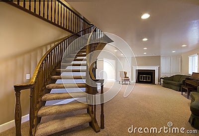 Living Room with Stairs going up Stock Photo