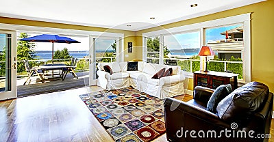 Living room with walkout deck and bay view. Tacoma real estate, Stock Photo
