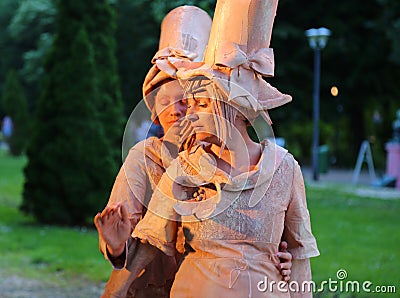 Living statue - french women happy Editorial Stock Photo