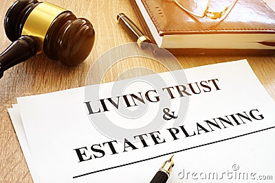 Living trust and estate planning form on desk. Stock Photo