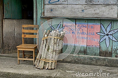 Livingston, Caribbean, Guatemala: old chair and bundle of wood Editorial Stock Photo