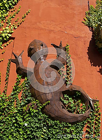 Lizard made of iron For decoration On a wall Stock Photo