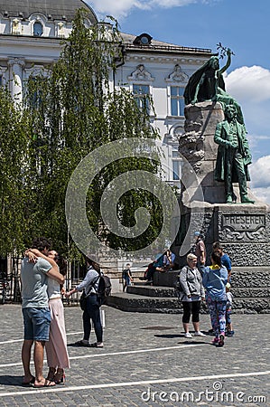 Ljubljana, kiss, love, couple, France PreÅ¡eren, statue, monument, skyline, PreÅ¡eren Square, Slovenia, Europe, art, Muse, poetry Editorial Stock Photo