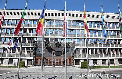Ljubljana, L, Slovenia - August 15, 2023: Slovenian Parliament Building of the European capital and more flags Editorial Stock Photo