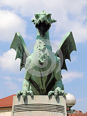 Ljubljana, L, Slovenia - August 16, 2023: Winged dragon symbol of city on bridge called zmajski most in slovenian Editorial Stock Photo