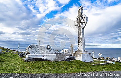Llandudno , Wales, UK - April 22 2018 : Dramatic graves standing at St Tudno`s church and cemetery on the Great Orme at Editorial Stock Photo