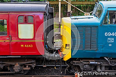 Diesel engine coupled up to old style carrages Editorial Stock Photo