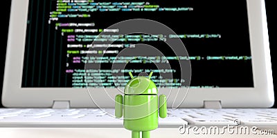 Google Android OS logo mascot standing alone facing computer screen with code Editorial Stock Photo