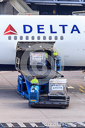 Loading air cargo containers Editorial Stock Photo