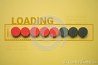 Loading bar with red wood circle block on yellow background. Loading concept Stock Photo