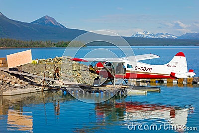 Loading a bush plane in the yukon Editorial Stock Photo