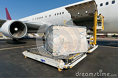Loading cargo plane Stock Photo