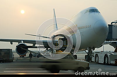 Loading cargo to airplane Stock Photo