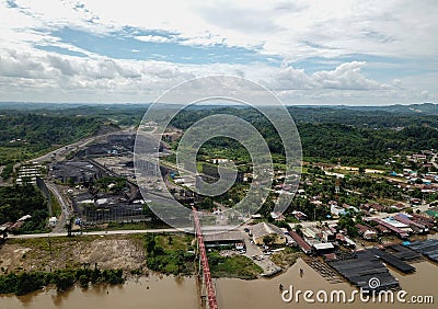 Loading coal onto the barge from the stock pile, aerial view Editorial Stock Photo