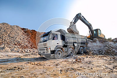 Loading a large lorry building material Stock Photo