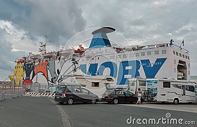 Loading transport and passengers on Moby Vincent ferry. Livorno, Italy Editorial Stock Photo