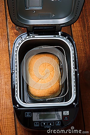 The loaf of bread baked in the bread machine Stock Photo