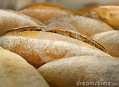 Loafs of French sourdough or French baguette, Freshly baked traditional french bread. Stock Photo