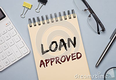 Loan approved inscription on paper. Financial borrowing and lending concept Stock Photo