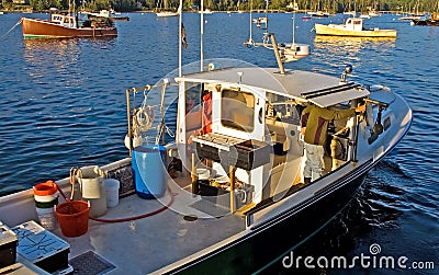 Lobster boat at work Stock Photo