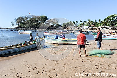 Lobster fisherman on the beach of Los Cobanos Editorial Stock Photo