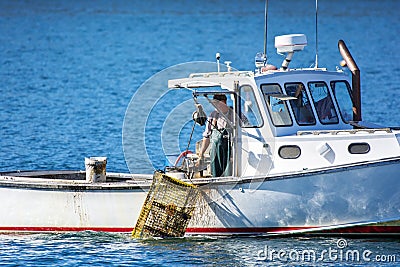 Lobster fishing boat in autumn in coastal Maine, New England Editorial Stock Photo