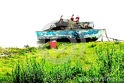 Lobster Traps in Small Rustic Dinghy Boat Stock Photo