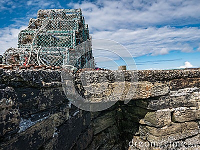 Lobster Traps on Stone Pier, Orkney Stock Photo