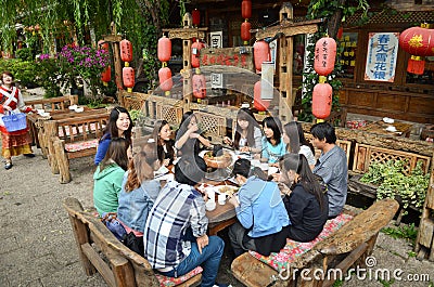 Local Chinese people eating outside Editorial Stock Photo