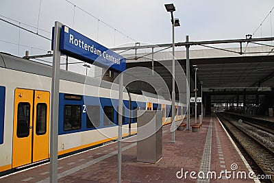 Local commuter type sprinter waiting on Rotterdam Central Station at platform to leave to Gouda Editorial Stock Photo