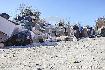 Local dump overflowing from Christmas trash and waste ground view Editorial Stock Photo