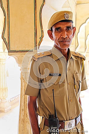 Local guard standing in Sattais Katcheri Hall, Amber Fort, Jaipur, India Editorial Stock Photo