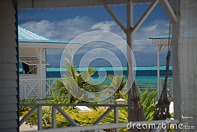 Local houses by the beach. Raiatea, French Polynesia Stock Photo