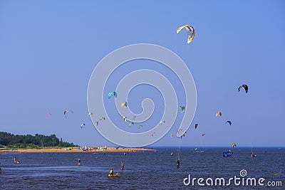 Local kitesurfing, popular extreme sailing and water sport Editorial Stock Photo