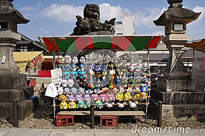 Local masks shop and souvenir japanese style for sale travelers people in street market festival at Naritasan Shinshoji at Japan Editorial Stock Photo