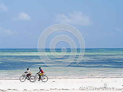 Local people biking in Zanzibar. Editorial Stock Photo