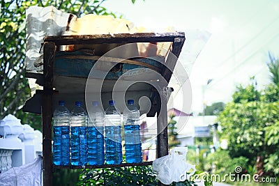 The local sell Pertalite in plastic bottles in urban area of Indonesia Stock Photo