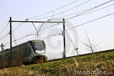 Local SLT Sprinter train on a slope in Nieuwerkerk aan den IJssel Editorial Stock Photo