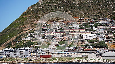 Local South African township housing residence area around Hout Bay hill side landscape from ocean Editorial Stock Photo