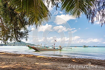 Local taxi boats in the sea water on Sairee Beach on Koh Tao island in Thailand Stock Photo