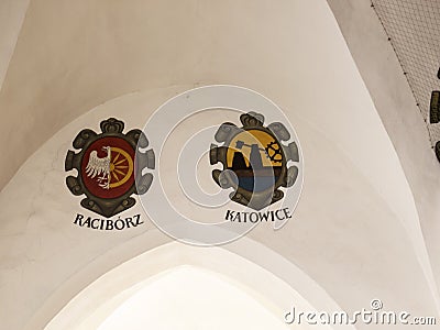 Local Town coats of arms in the Cloth Hall on the main Market Square in Krakow, Poland is a haven for shopping Editorial Stock Photo