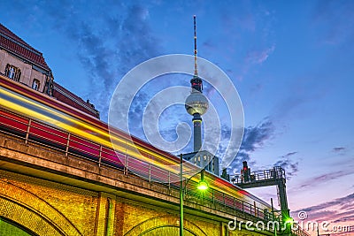 Local train with motion blur and the famous Television Tower Editorial Stock Photo