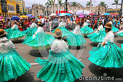 Local women dancing during Festival of the Virgin de la Candelaria in Lima, Peru. Editorial Stock Photo