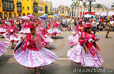 Local women dancing during Festival of the Virgin de la Candelaria in Lima, Peru. Editorial Stock Photo