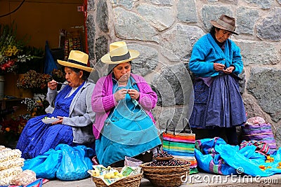 Local women sitting at the market in Ollantaytambo, Peru Editorial Stock Photo